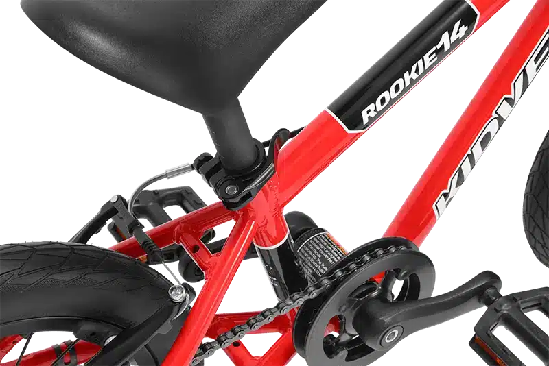 Close-up of Rookie 14 kids bike showing adjustable saddle, drivetrain, crank set & light-weight frame